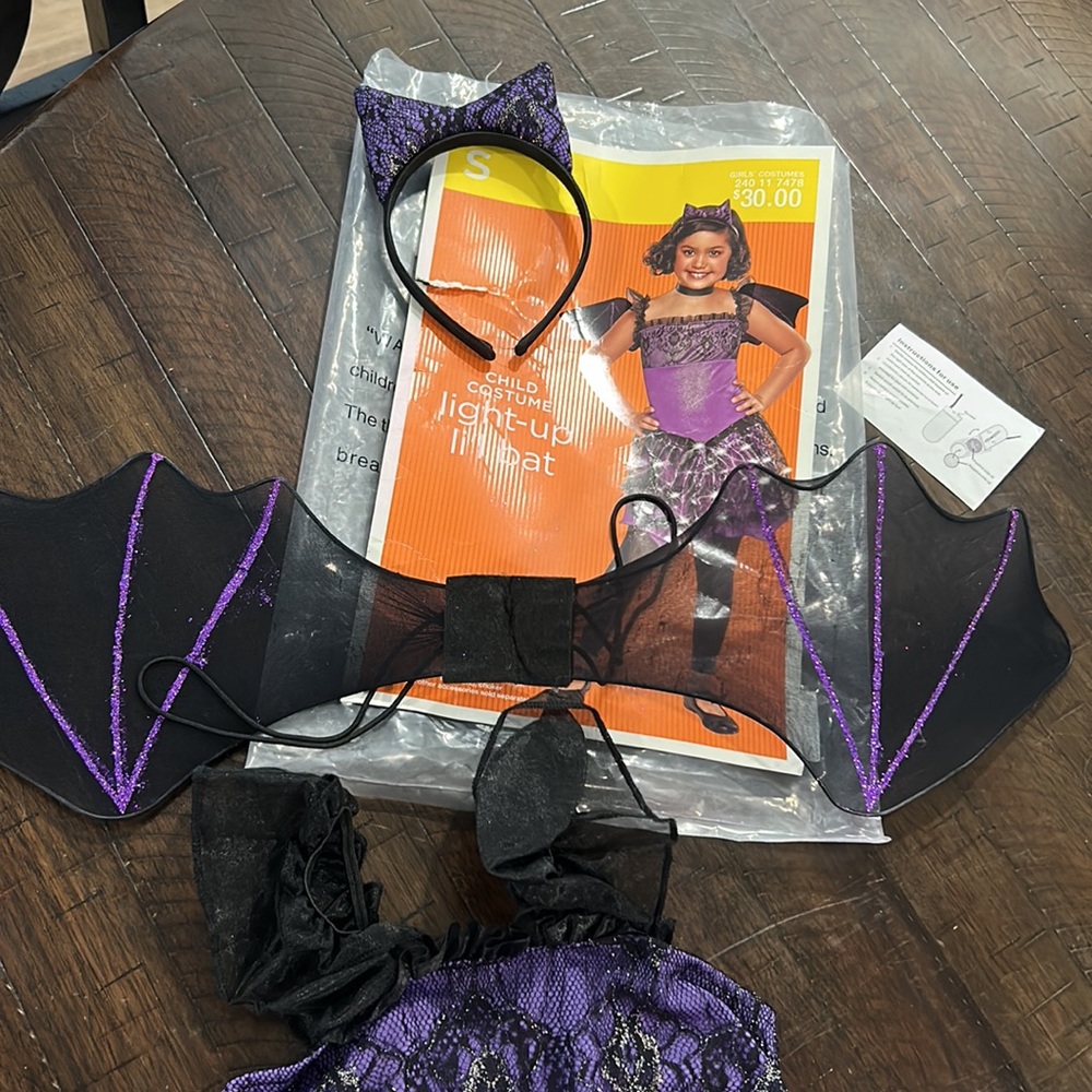 Little bat light up skirt. One piece Child costume in purple silver and black